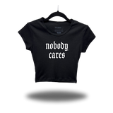 NOBODY CARES CAP SLEEVE BABY RIB CROP TOP