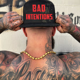 BAD INTENTIONS BLACK CAMO FLAT BILL HAT