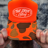 BADGE FOAM CURVED BILL ORANGE CAMO HAT