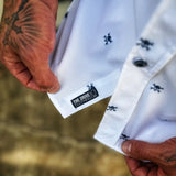 ESSENTIAL WHITE NOBODY CARES BUTTON UP