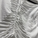 ROAD RASH BACK SLASHED BRAIDED WHITE CROP TOP