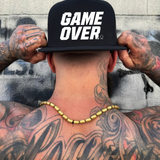 GAME OVER FLAT BILL HAT