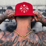 SKULLS & CROSSBONES RED FLAT BILL HAT