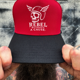 REBEL RED BLACK CURVED TRUCKER HAT