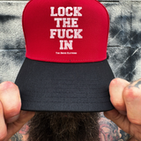 LOCK IN RED BLACK CURVED TRUCKER HAT