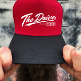 DRIVE GLOBES RED BLACK CURVED TRUCKER HAT