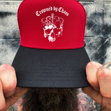 CROWNED CHAOS RED BLACK CURVED TRUCKER HAT
