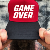 GAME OVER RED BLACK CURVED TRUCKER HAT