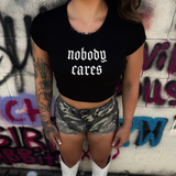 NOBODY CARES CAP SLEEVE BABY RIB CROP TOP