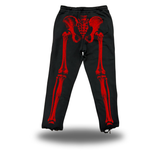 SKELETON ROAD RASH BLACK OPEN-BOTTOM SWEATPANTS - RED