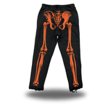 SKELETON ROAD RASH BLACK OPEN-BOTTOM SWEATPANTS - ORANGE